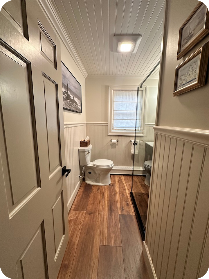 Half Bathroom to Three-Quarter Bathroom Remodel with Rounded Corners